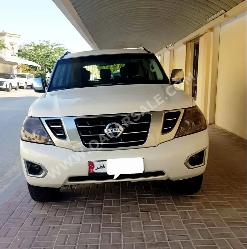 Nissan  Patrol  SE  2015  Automatic  195,000 Km  8 Cylinder  Four Wheel Drive (4WD)  SUV  White