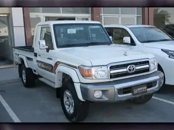 Toyota  Land Cruiser  LX  2022  Manual  13,000 Km  6 Cylinder  Four Wheel Drive (4WD)  Pick Up  White  With Warranty