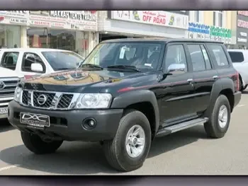 Nissan  Patrol  GL  2021  Manual  69,000 Km  6 Cylinder  Four Wheel Drive (4WD)  SUV  Black  With Warranty