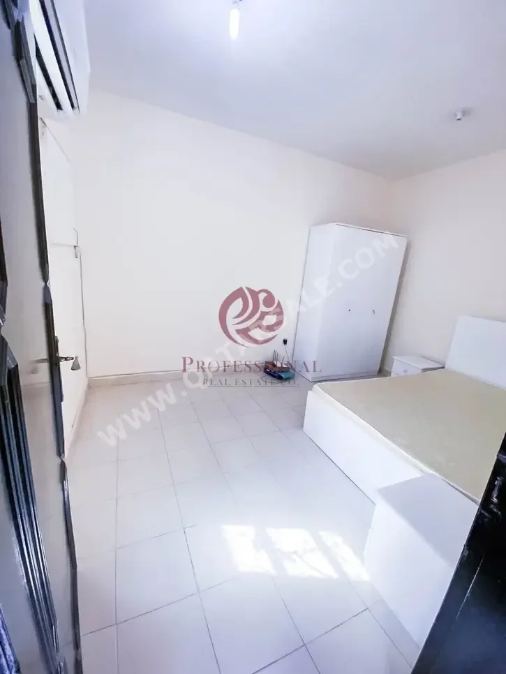 2 Bedrooms  Apartment  For Rent  Doha -  Al Duhail  Not Furnished