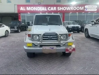 Toyota  Land Cruiser  LX  2006  Manual  228,000 Km  6 Cylinder  Four Wheel Drive (4WD)  Pick Up  White