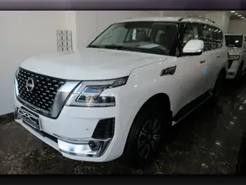 Nissan  Patrol  Titanium  2023  Automatic  0 Km  6 Cylinder  Four Wheel Drive (4WD)  SUV  White  With Warranty