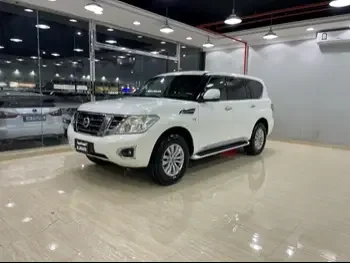 Nissan  Patrol  SE  2014  Automatic  229,000 Km  8 Cylinder  Four Wheel Drive (4WD)  SUV  White