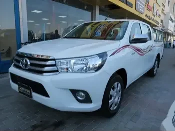 Toyota  Hilux  2021  Manual  7,000 Km  4 Cylinder  Rear Wheel Drive (RWD)  Pick Up  White