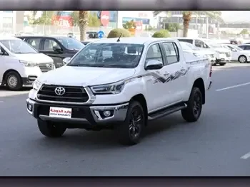 Toyota  Hilux  SR5  2024  Automatic  0 Km  4 Cylinder  Four Wheel Drive (4WD)  Pick Up  White  With Warranty