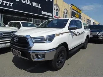 Toyota  Hilux  2024  Automatic  2,000 Km  4 Cylinder  Four Wheel Drive (4WD)  Pick Up  White  With Warranty