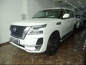 Nissan  Patrol  Titanium  2023  Automatic  0 Km  6 Cylinder  Four Wheel Drive (4WD)  SUV  White  With Warranty