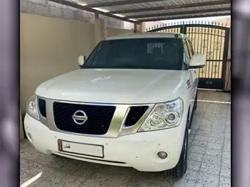 Nissan  Patrol  SE  2013  Automatic  240,000 Km  8 Cylinder  Four Wheel Drive (4WD)  SUV  Pearl