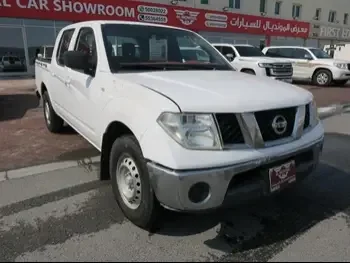 Nissan  Navara  2012  Manual  346,000 Km  4 Cylinder  Four Wheel Drive (4WD)  Pick Up  White