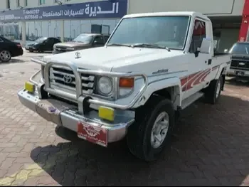 Toyota  Land Cruiser  LX  2006  Manual  228,000 Km  6 Cylinder  Four Wheel Drive (4WD)  Pick Up  White