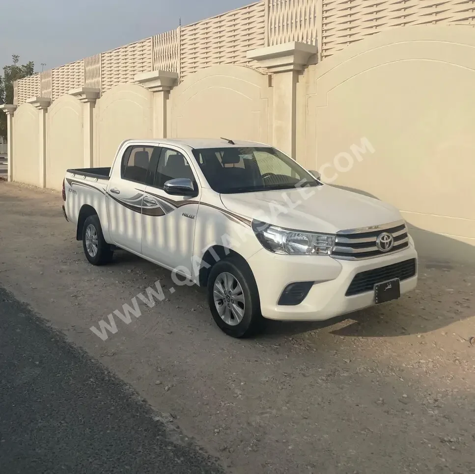 Toyota  Hilux  2019  Automatic  112,000 Km  4 Cylinder  Rear Wheel Drive (RWD)  Pick Up  White