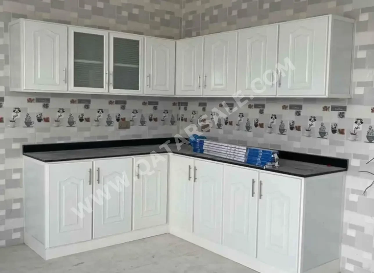 أدراج وخزائن المطبخ أبيض  قطر