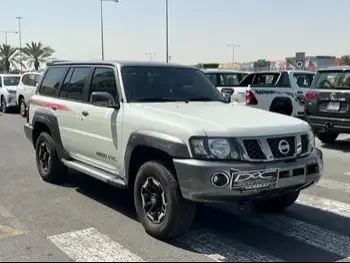 Nissan  Patrol  Super Safari  2021  Automatic  28,000 Km  6 Cylinder  Four Wheel Drive (4WD)  SUV  White