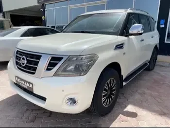 Nissan  Patrol  Platinum  2015  Automatic  268,000 Km  8 Cylinder  Four Wheel Drive (4WD)  SUV  White