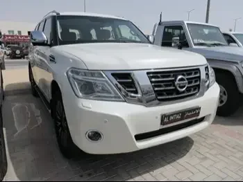 Nissan  Patrol  Platinum  2015  Automatic  165,000 Km  8 Cylinder  Four Wheel Drive (4WD)  SUV  White