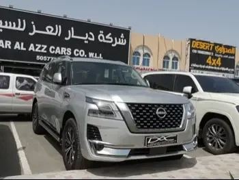 Nissan  Patrol  Titanium  2023  Automatic  0 Km  8 Cylinder  Four Wheel Drive (4WD)  SUV  Silver  With Warranty