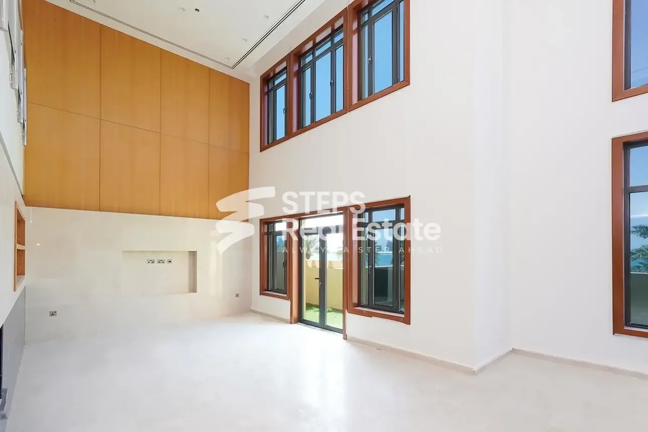 5 Bedrooms  Apartment  For Rent  in Doha -  The Pearl  Semi Furnished