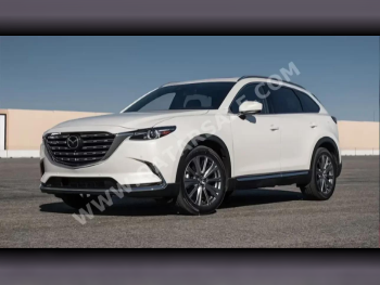 Mazda  CX 9  4 Cylinder  SUV 2x4  White  2023