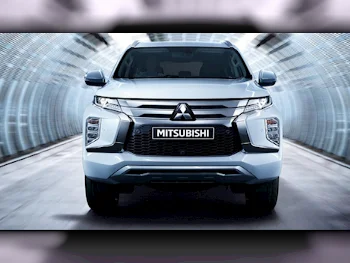 Mitsubishi  Montero Sport  4 Cylinder  SUV 4x4  White  2023