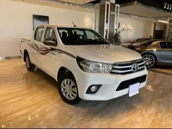 Toyota  Hilux  2020  Automatic  35,000 Km  4 Cylinder  Rear Wheel Drive (RWD)  Pick Up  White