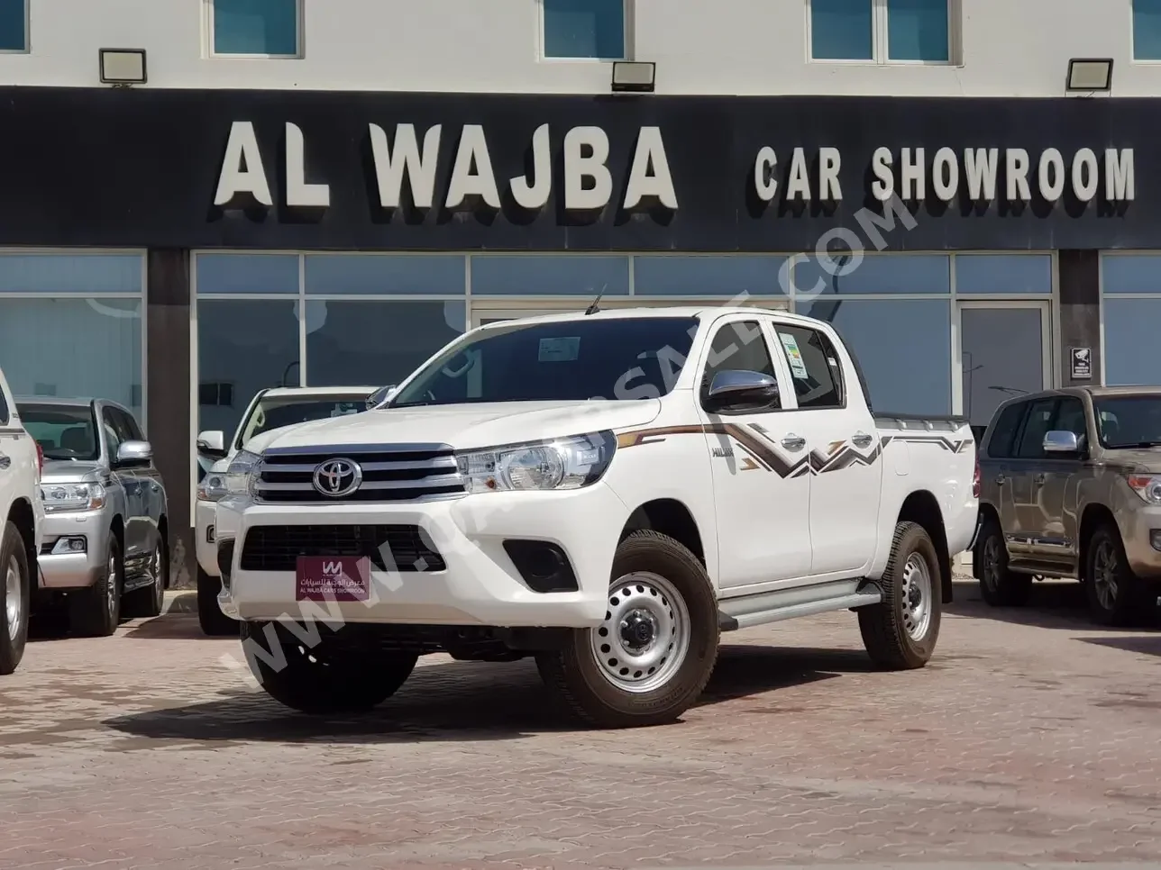 Toyota  Hilux  2024  Automatic  7,000 Km  4 Cylinder  Four Wheel Drive (4WD)  Pick Up  White  With Warranty