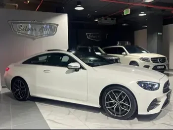 Mercedes-Benz  E-Class  200 AMG  2023  Automatic  12,000 Km  4 Cylinder  Rear Wheel Drive (RWD)  Coupe / Sport  White  With Warranty