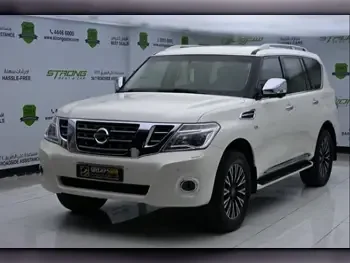 Nissan  Patrol  Platinum  2015  Automatic  146,000 Km  8 Cylinder  Four Wheel Drive (4WD)  SUV  White