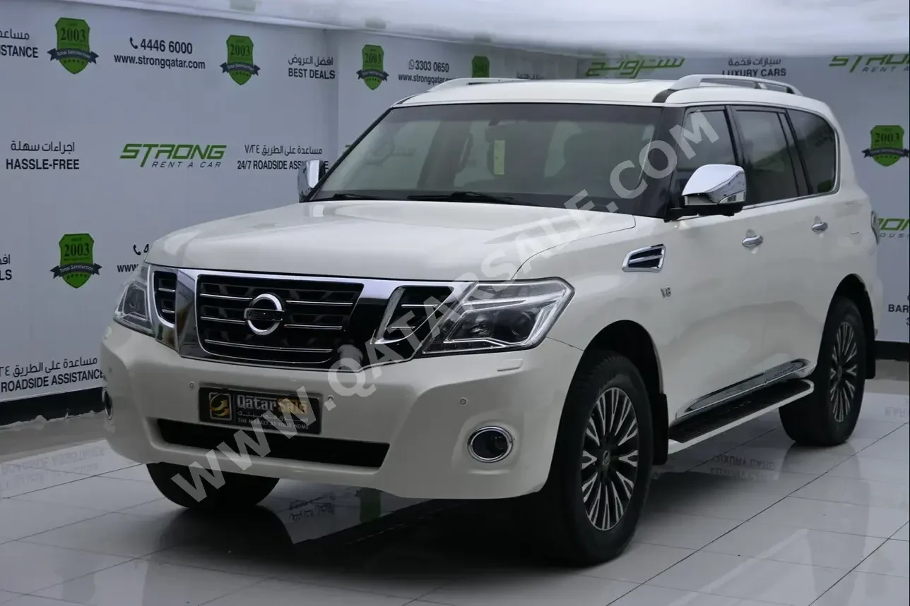 Nissan  Patrol  Platinum  2015  Automatic  146,000 Km  8 Cylinder  Four Wheel Drive (4WD)  SUV  White