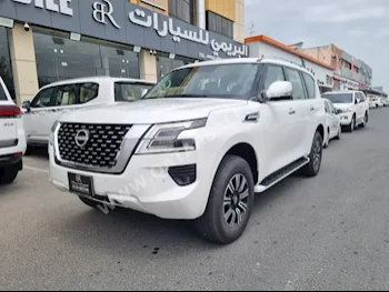  Nissan  Patrol  SE  2023  Automatic  0 Km  6 Cylinder  Four Wheel Drive (4WD)  SUV  White  With Warranty