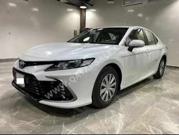 Toyota  Camry  LE  2024  Automatic  0 Km  4 Cylinder  Front Wheel Drive (FWD)  Sedan  White  With Warranty