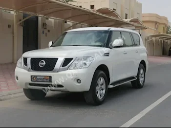 Nissan  Patrol  SE  2012  Automatic  245,000 Km  8 Cylinder  Four Wheel Drive (4WD)  SUV  White