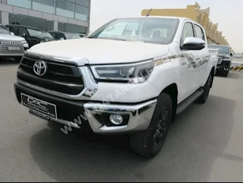 Toyota  Hilux  2024  Automatic  0 Km  4 Cylinder  Four Wheel Drive (4WD)  Pick Up  White  With Warranty