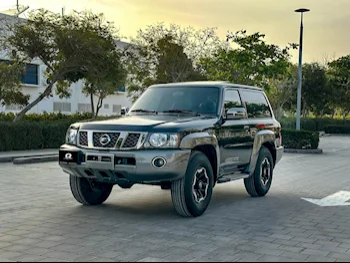 Nissan  Patrol  Super Safari  2021  Manual  26,000 Km  6 Cylinder  Four Wheel Drive (4WD)  SUV  Black  With Warranty