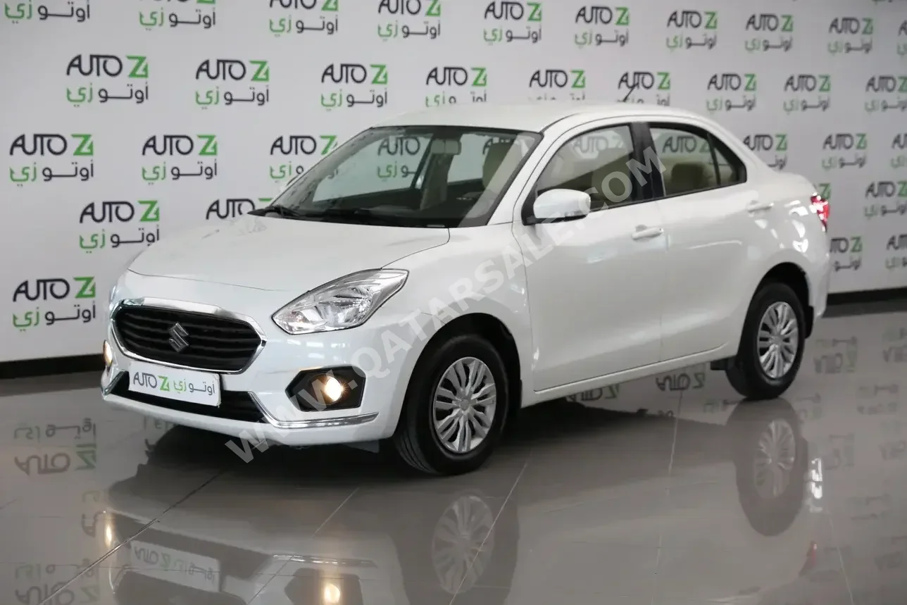 Suzuki  Dzire  2022  Automatic  73,000 Km  4 Cylinder  Front Wheel Drive (FWD)  Sedan  White  With Warranty