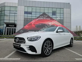 مرسيدس - بنز  اي - كلاس  300 AMG  2023  اوتوماتيك  10,500 كم  4 سلندر  دفع خلفي  سيدان  أبيض  تحت الضمان