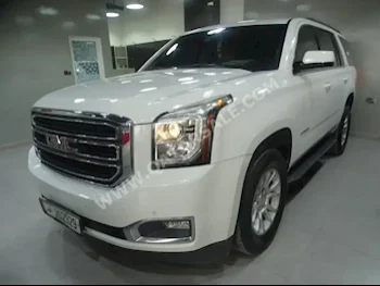 GMC  Yukon  SLE  2018  Automatic  52,000 Km  8 Cylinder  Rear Wheel Drive (RWD)  SUV  White