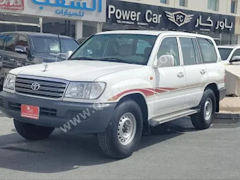 Toyota  Land Cruiser  GX  2003  Manual  230,000 Km  6 Cylinder  Four Wheel Drive (4WD)  SUV  White