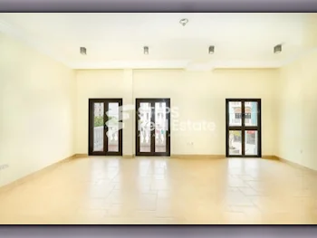 2 Bedrooms  Apartment  For Rent  in Doha -  The Pearl  Semi Furnished