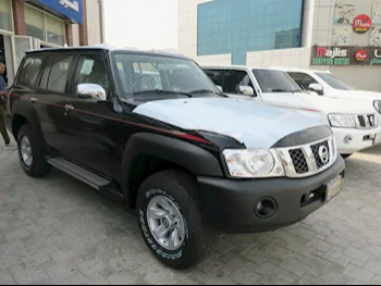 Nissan  Patrol  GL  2023  Manual  0 Km  6 Cylinder  Four Wheel Drive (4WD)  SUV  Black  With Warranty