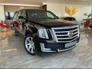 Cadillac  Escalade  Platinum  2015  Automatic  147,000 Km  8 Cylinder  Four Wheel Drive (4WD)  SUV  Black