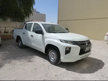 Mitsubishi  L 200  Diesel  2022  Manual  2,000 Km  4 Cylinder  Rear Wheel Drive (RWD)  Pick Up  White