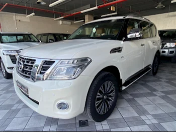 Nissan  Patrol  Platinum  2015  Automatic  146,000 Km  8 Cylinder  Four Wheel Drive (4WD)  SUV  White