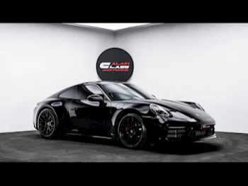 Porsche  911  Carrera 4S  2021  Automatic  35,432 Km  6 Cylinder  Rear Wheel Drive (RWD)  Coupe / Sport  Black  With Warranty