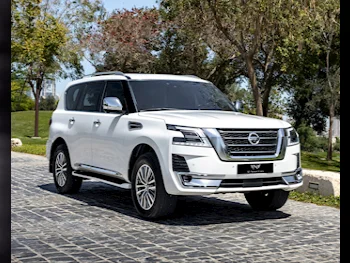 Nissan  Patrol  Platinum  2020  Automatic  165,000 Km  6 Cylinder  Four Wheel Drive (4WD)  SUV  White