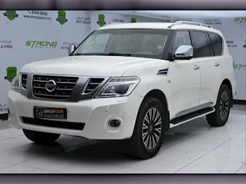 Nissan  Patrol  Platinum  2014  Automatic  221,000 Km  8 Cylinder  Four Wheel Drive (4WD)  SUV  White