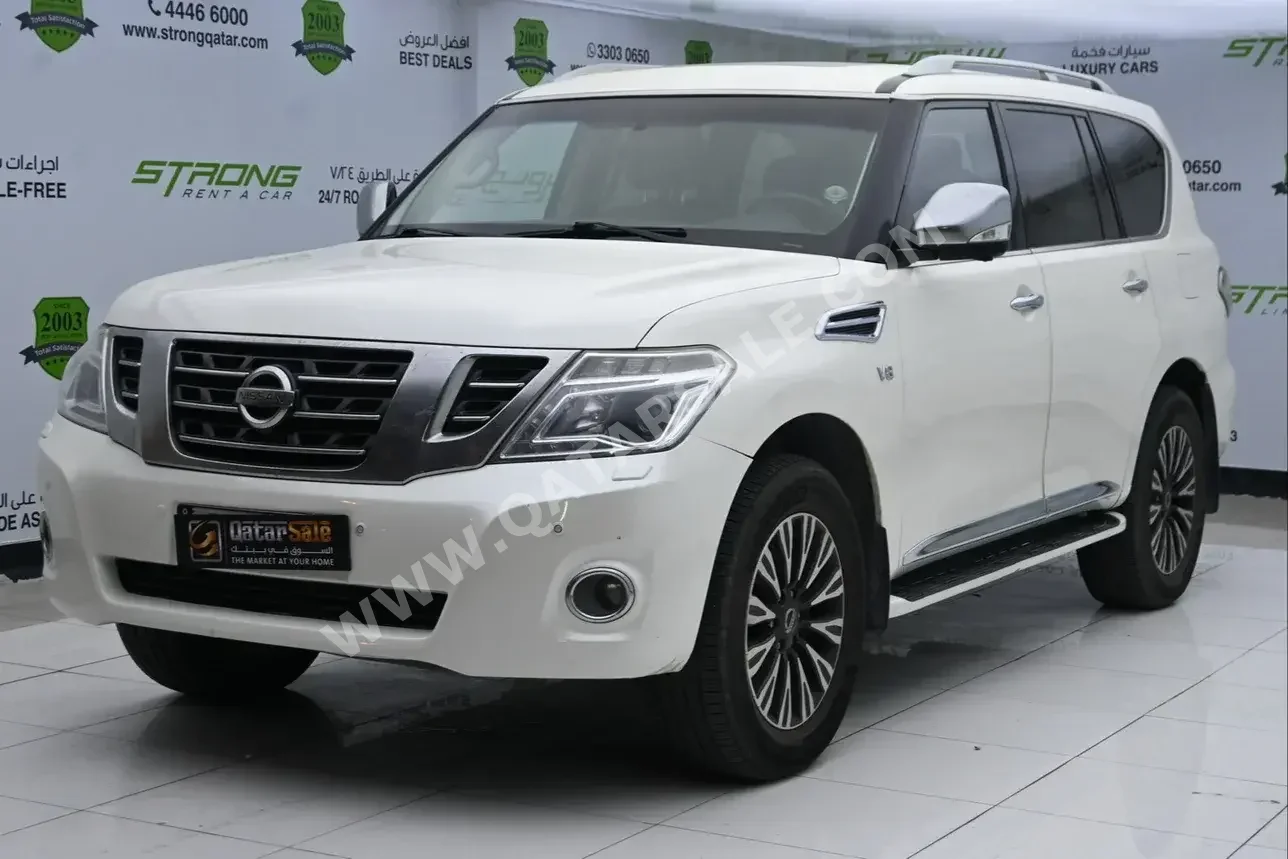 Nissan  Patrol  Platinum  2014  Automatic  221,000 Km  8 Cylinder  Four Wheel Drive (4WD)  SUV  White