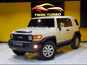 Toyota  FJ Cruiser  2023  Automatic  15,000 Km  6 Cylinder  Four Wheel Drive (4WD)  SUV  Beige  With Warranty