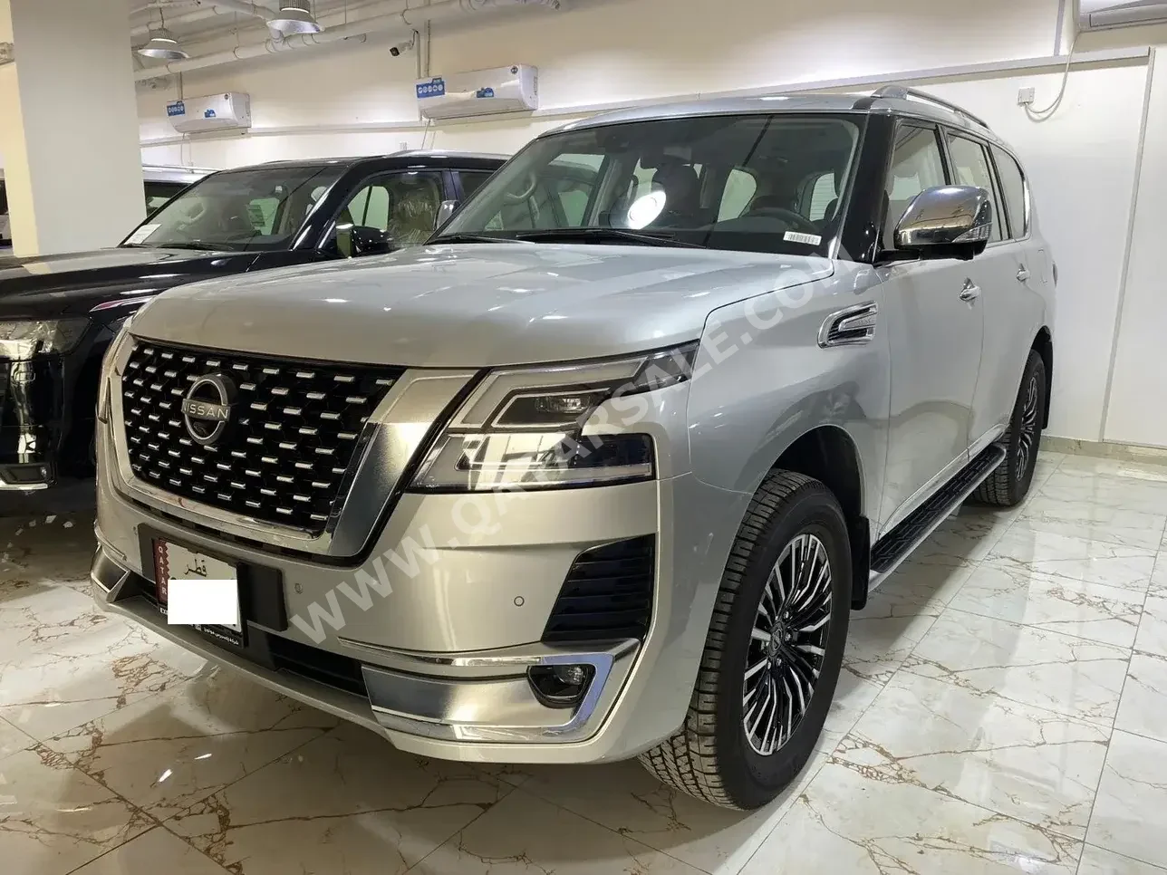 Nissan  Patrol  Platinum  2023  Automatic  0 Km  6 Cylinder  Four Wheel Drive (4WD)  SUV  Silver  With Warranty