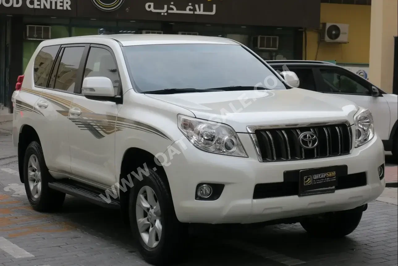 Toyota  Prado  TXL  2013  Automatic  74,500 Km  6 Cylinder  Four Wheel Drive (4WD)  SUV  White