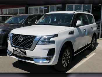 Nissan  Patrol  Titanium  2024  Automatic  0 Km  6 Cylinder  Four Wheel Drive (4WD)  SUV  White  With Warranty